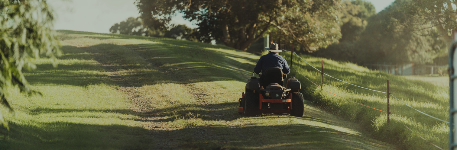 Man riding lawn mower